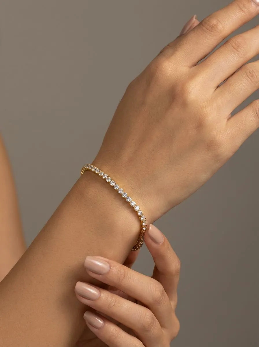 KLARLINJE Pozlátený tenisový náramok so zirkónmi